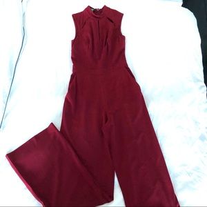 Bebe Red window colored jumpsuit